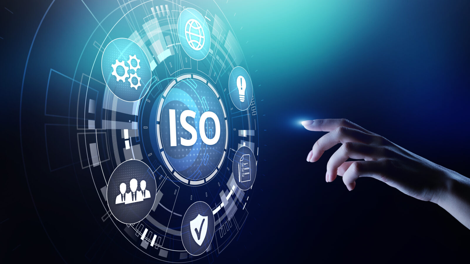 An abstract digital interface featuring the word “ISO” at the center, surrounded by icons representing processes, security, and collaboration, with a hand guiding the action in a technological setting